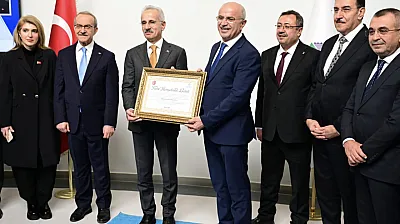 Bakan Uraloğlu'na Başkan Er'den Fahri Hemşehrilik Beratı